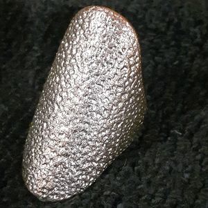 Long silver metal ring